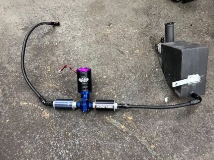 Bumper location fuel cell with a magnafuel 750 pro star fuel pump and dual filters