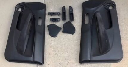 Clean set of EM1 door panels for sale Colour- Dark grey